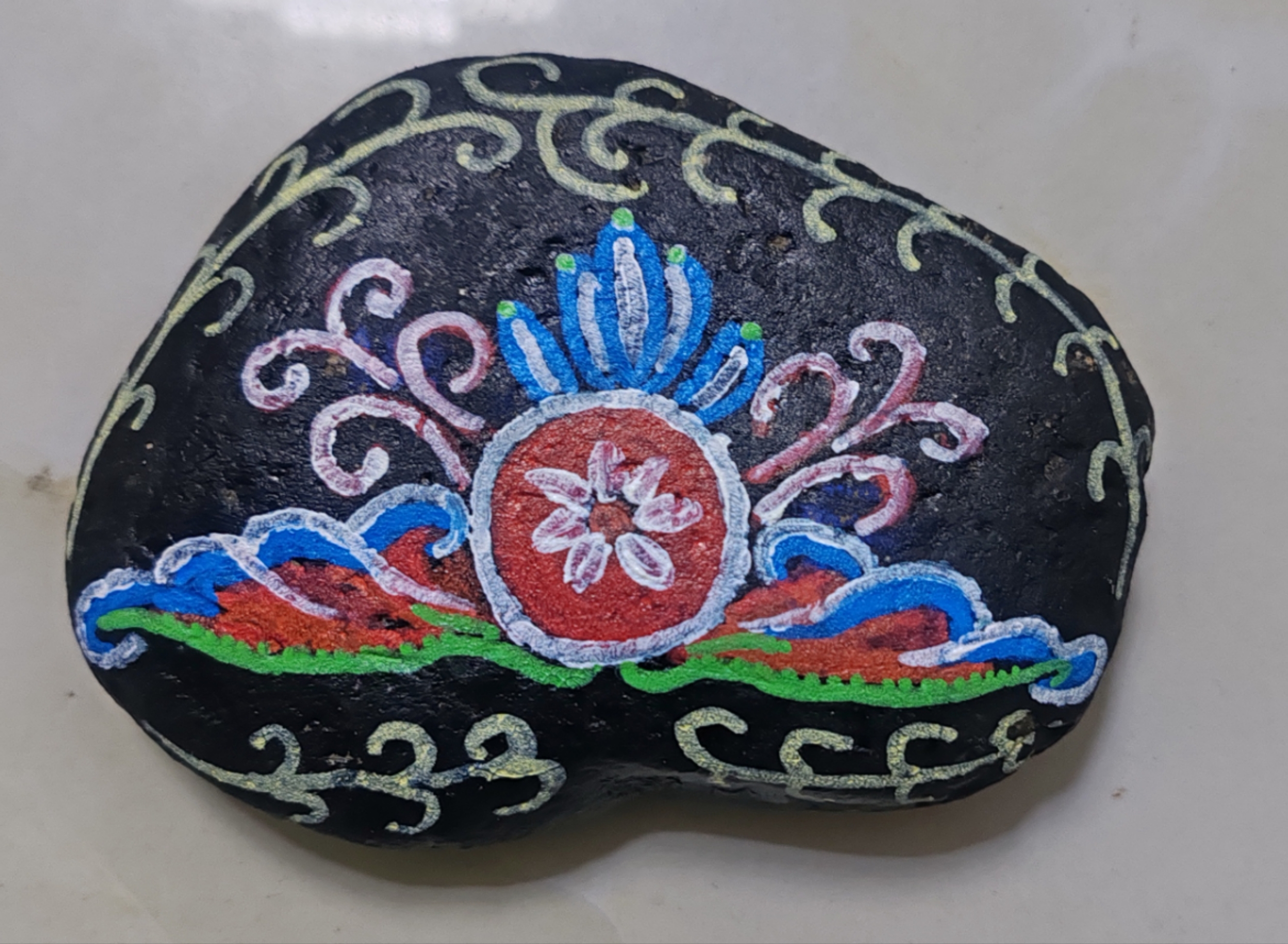 苗族紋樣石頭畫。