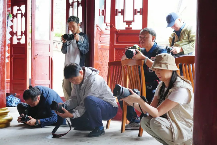 海內外攝影師走進西秀區 探尋“屯堡秘境 西部之秀”。