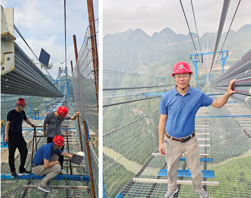 馬宗源與其他博士在花江峽谷大橋施工現場開展主纜架設北斗衛星定位科研工作。